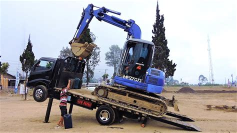 mini excavation loaded in a pickup truck|45 50 mini truck transport.